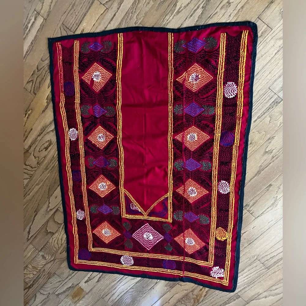 Suzane embroidered with cotton threads on cotton red fabric, hand made